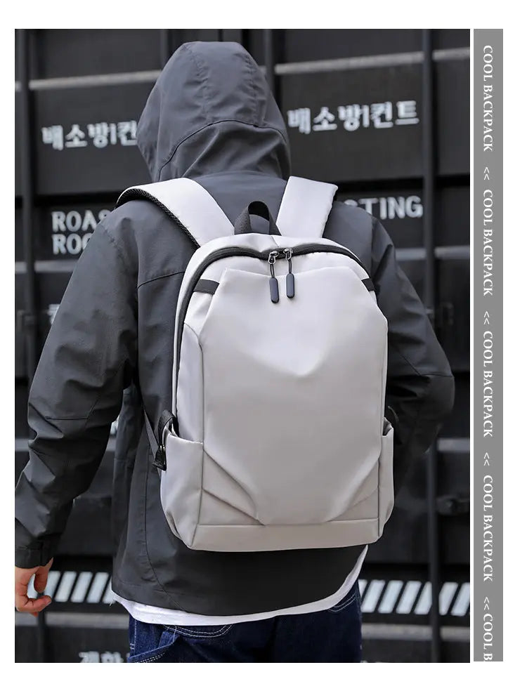 Grey Modern Anti-Theft Laptop Backpack with USB Charging Port - Water-Repellent Travel & Business Bag for 15.6 Inch Laptops Femina Worldwide
