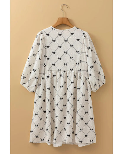 White Bowtie Pattern Textured Puff Half Sleeve Loose Mini Dress - M Femina Worldwide