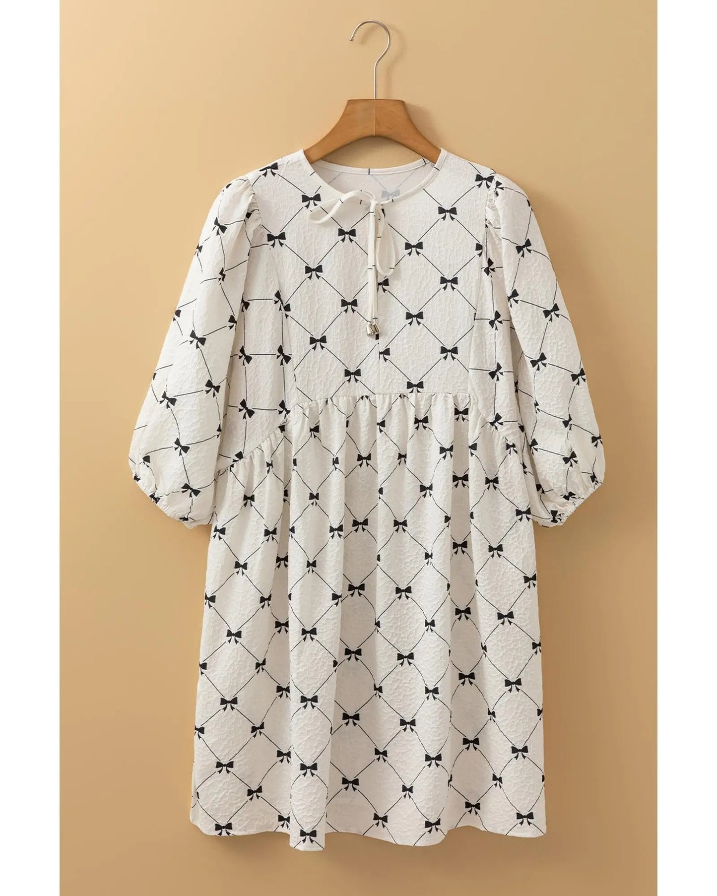 White Bowtie Pattern Textured Puff Half Sleeve Loose Mini Dress - M Femina Worldwide