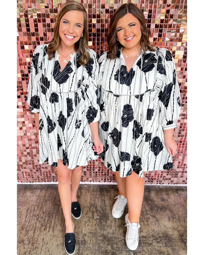Black Plus Size Floral 3/4 Puff Sleeve Lace-up Neck Mini Dress - 3X Femina Worldwide