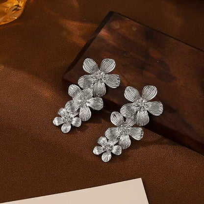 Sliver Textured Cascading Floral Statement Drop Earrings for Women Femina Worldwide