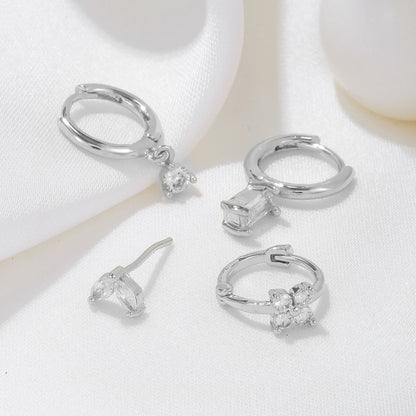Four-piece set Silver Delicate CZ Earring Stacking Set - Huggie Hoops & Studs for Multiple Piercings Femina Worldwide