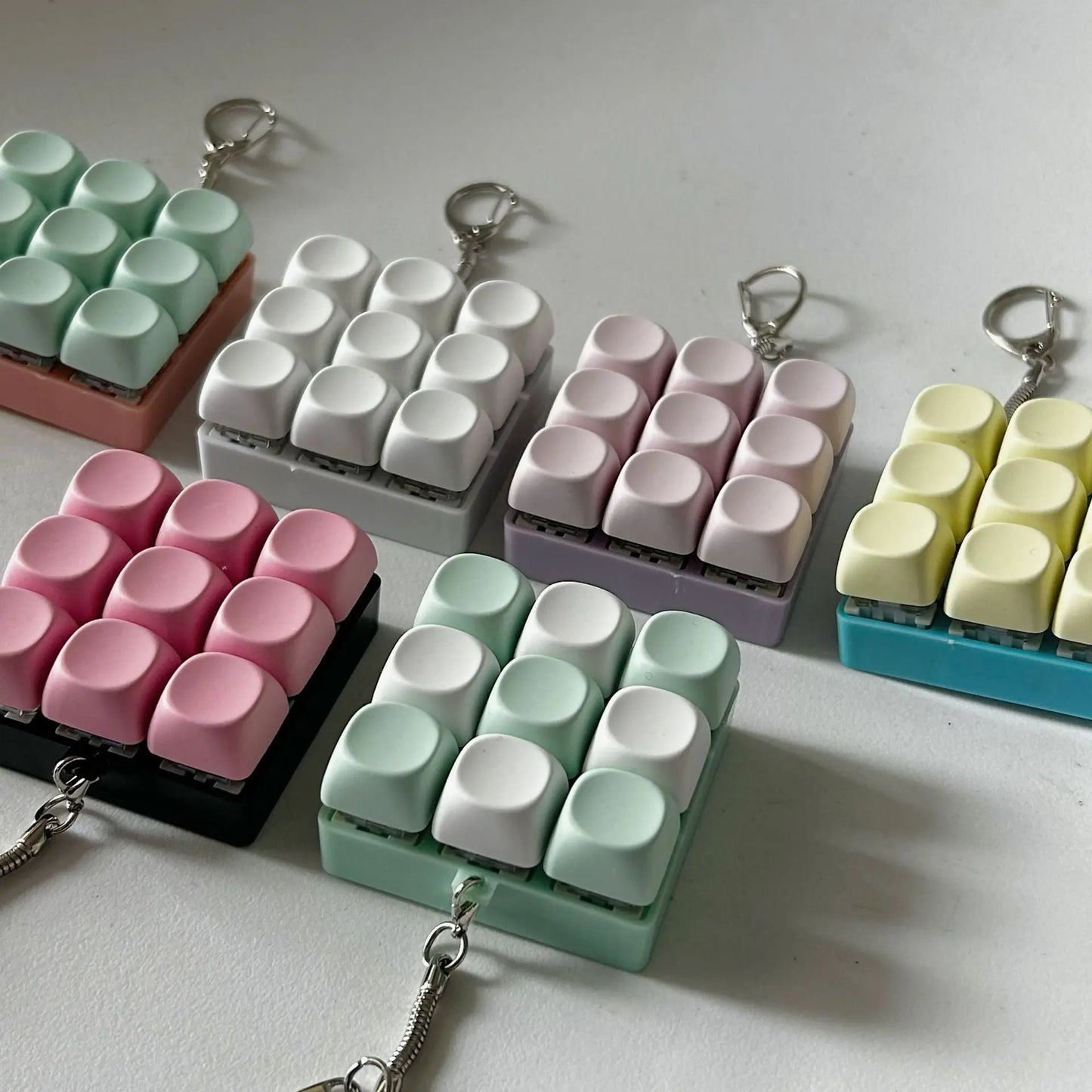 2-Pack Red Mechanical 9-Keyboard Fingertip Toy Keychain - Key Pressure Relief, PVC Fingertip Toy Femina Worldwide