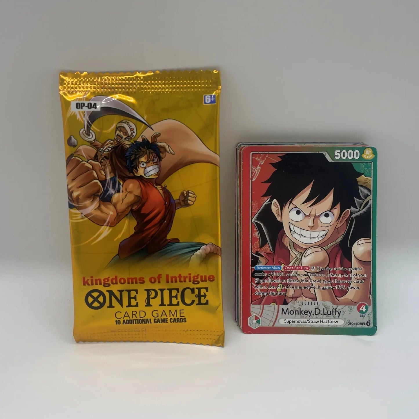 One Piece Themed Trading Card Game 300 Pieces Booster Box Set Kingdoms of Intrigue Anime Battle Collectibles Featuring Sabo Zoro and Sanji Yellow Edition Femina Worldwide