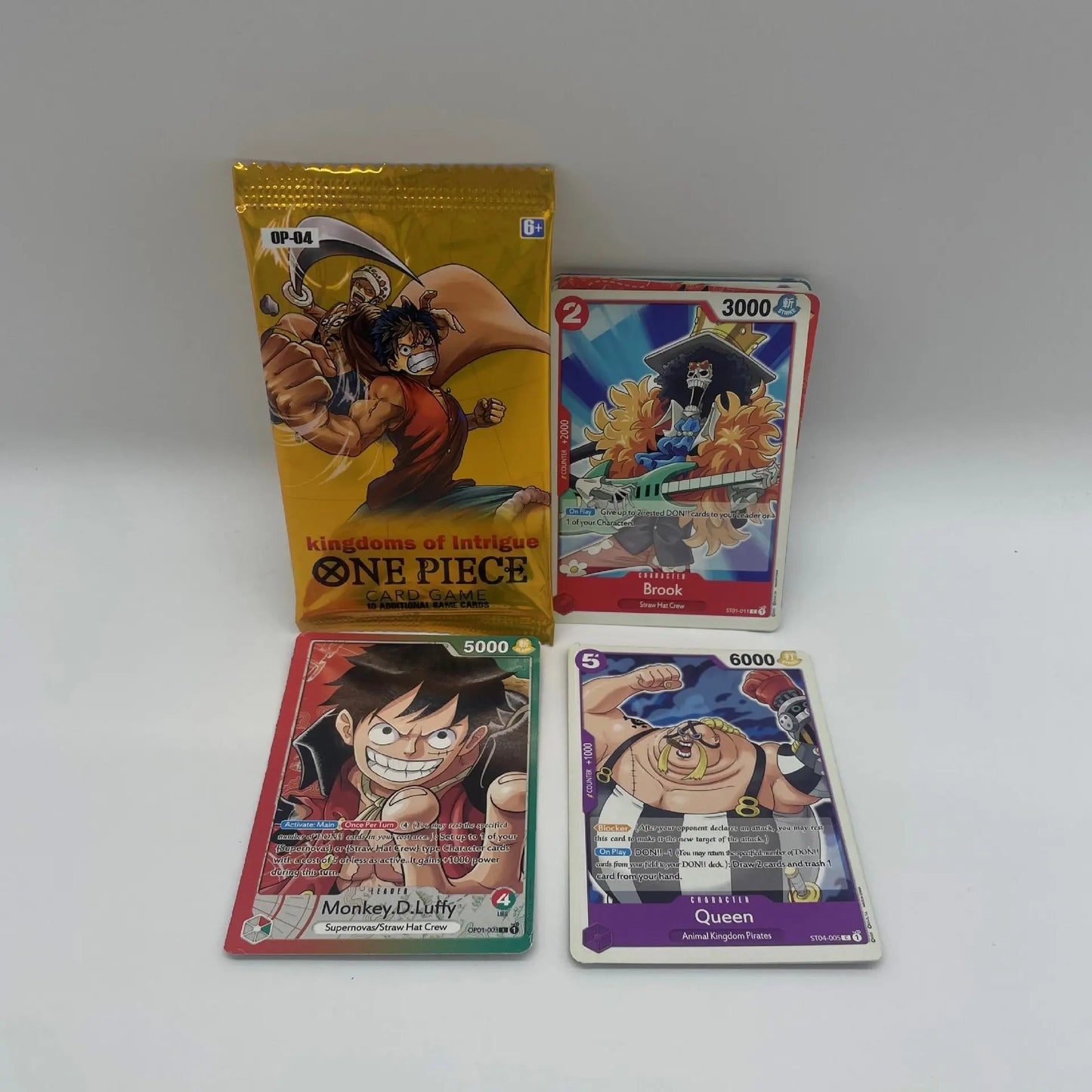 One Piece Themed Trading Card Game 300 Pieces Booster Box Set Kingdoms of Intrigue Anime Battle Collectibles Featuring Sabo Zoro and Sanji Yellow Edition Femina Worldwide