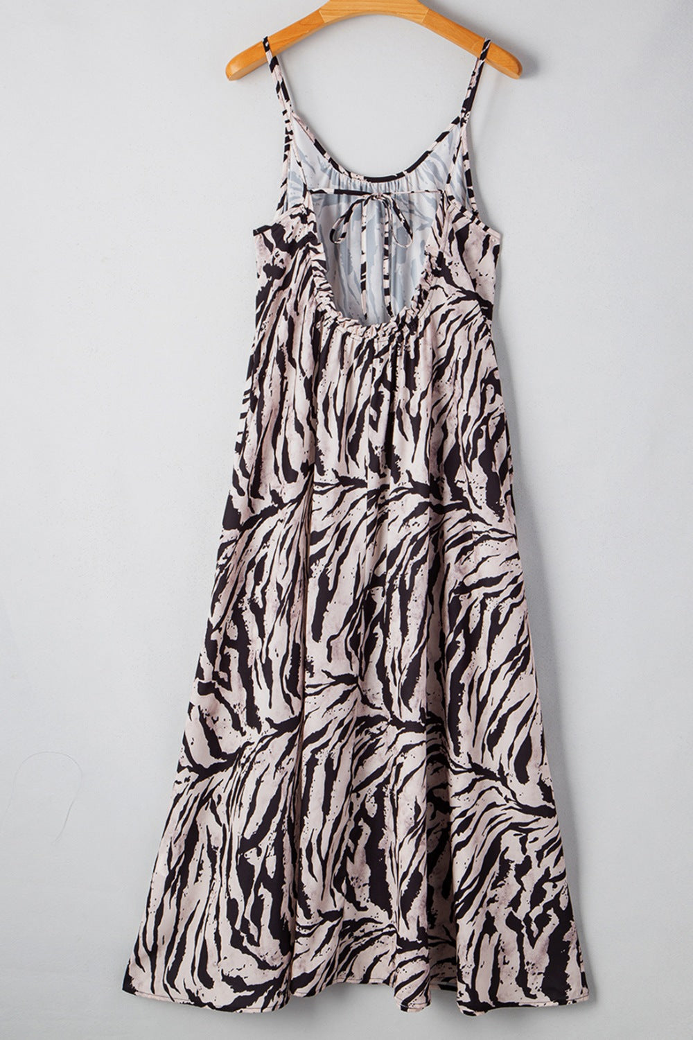 Lightweight maxi dress with abstract print and adjustable tie back