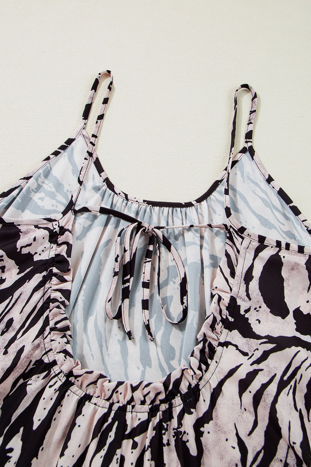 Lightweight maxi dress with abstract print and adjustable tie back