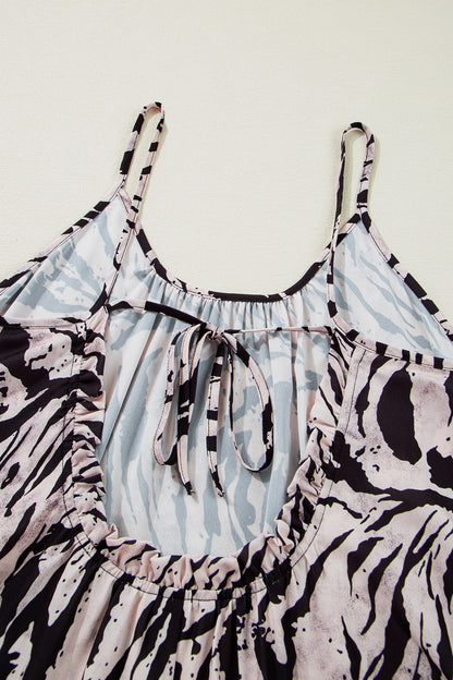Lightweight maxi dress with abstract print and adjustable tie back